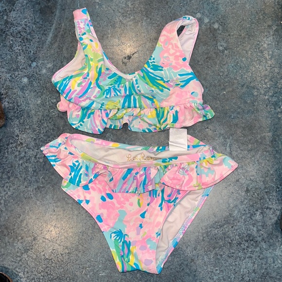 Lilly Pulitzer Other - Lilly Pulitzer Bathing Suit somewhat faded from ☀️ but still a lot of wear!